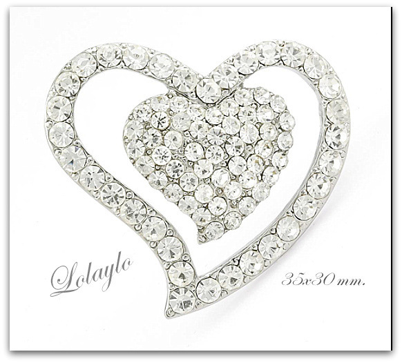 1-LOL1485139. 17€ 35X30mm. Plateado con símil