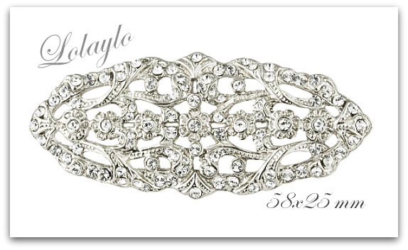 2-LOL140553. 18€ 58x25mm. Plateado o dorado con símil