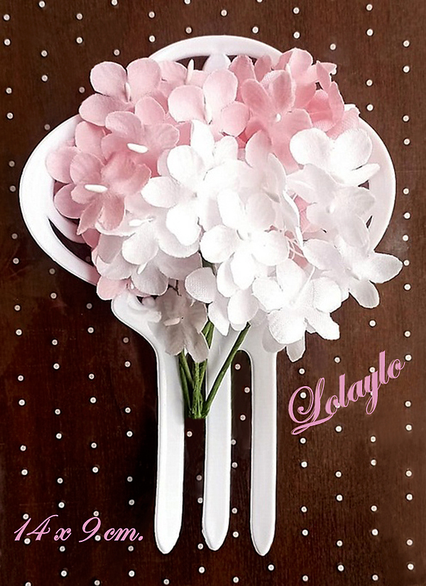 PEINETA CON FLORES 11€.